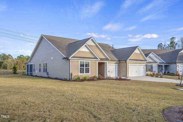 view of front of home with a garage, concrete driveway, and a front lawn