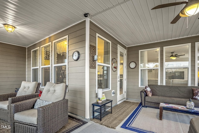 view of patio featuring covered porch and ceiling fan