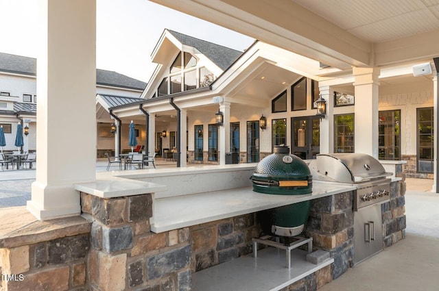 view of patio / terrace with a grill and an outdoor kitchen