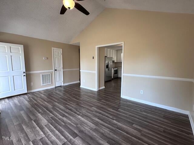 unfurnished living room featuring dark hardwood / wood-style floors, ceiling fan, a textured ceiling, and high vaulted ceiling