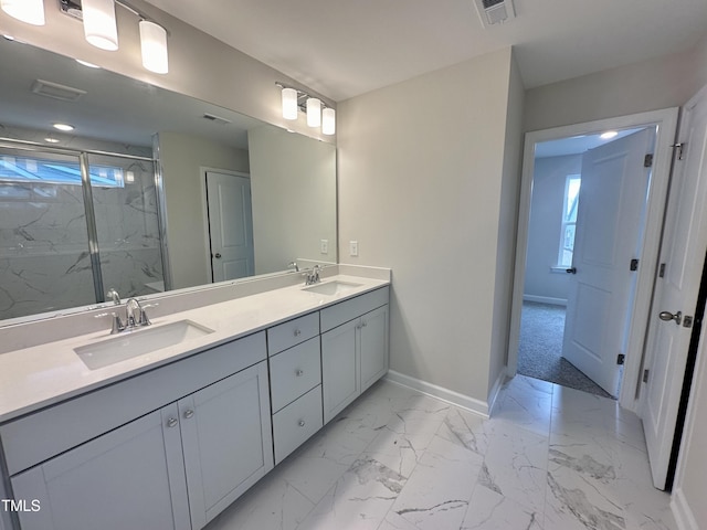 bathroom with vanity and walk in shower