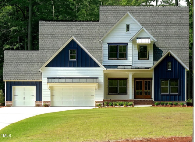 view of front facade featuring a garage and a front lawn