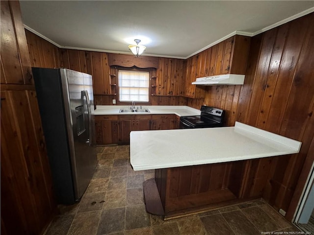 kitchen featuring wood walls, black range with electric stovetop, kitchen peninsula, sink, and stainless steel fridge with ice dispenser