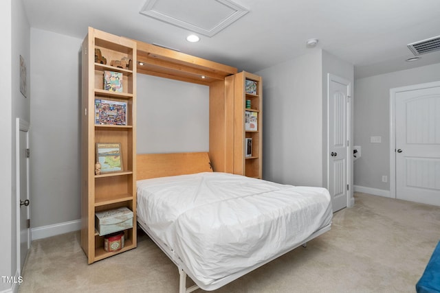 bedroom featuring light colored carpet