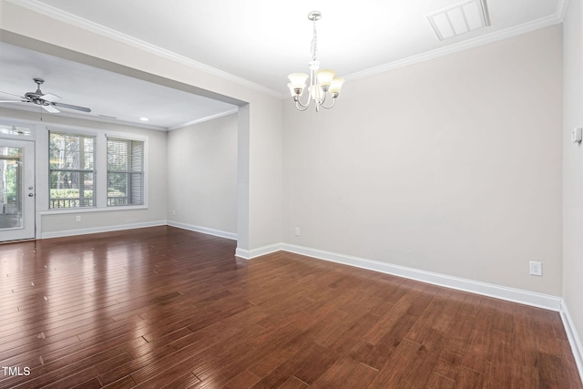 spare room featuring ceiling fan with notable chandelier, dark wood-type flooring, and crown molding