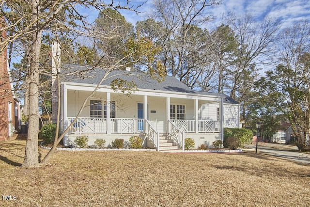 bungalow-style house featuring a front yard and a porch