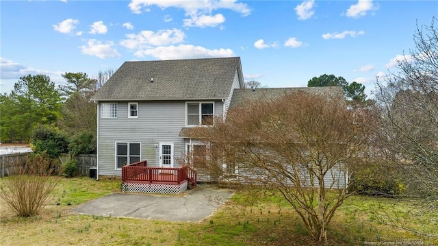 310 Interchange Dr, Fayetteville, NC 28311 - rear view of house featuring a patio, a deck, and a lawn