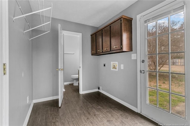 310 Interchange Dr, Fayetteville, NC 28311 - clothes washing area featuring washer hookup, electric dryer hookup, dark hardwood / wood-style flooring, and cabinets