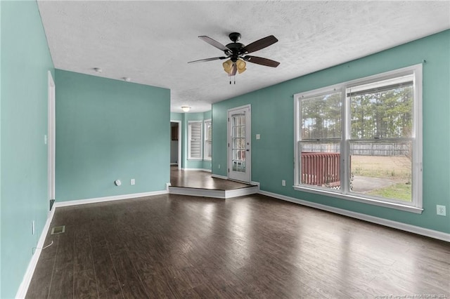 310 Interchange Dr, Fayetteville, NC 28311 - interior space with ceiling fan, hardwood / wood-style floors, and a textured ceiling