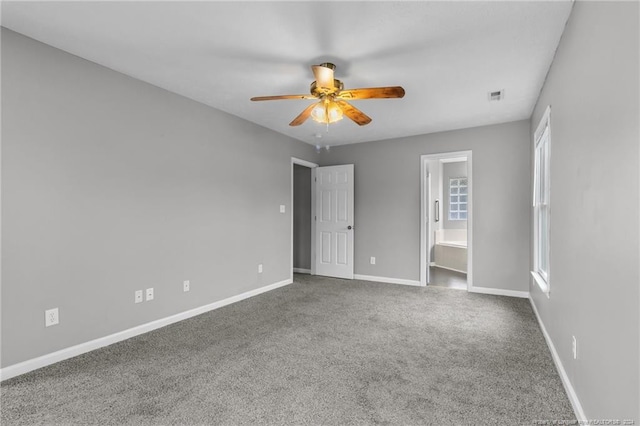 310 Interchange Dr, Fayetteville, NC 28311 - unfurnished bedroom featuring carpet floors, ensuite bathroom, and ceiling fan