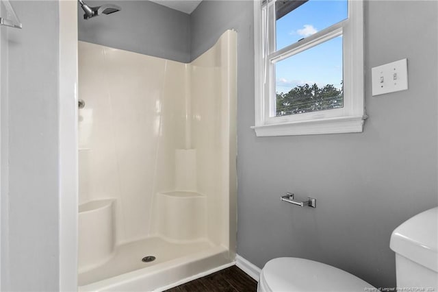 310 Interchange Dr, Fayetteville, NC 28311 - bathroom with toilet, wood-type flooring, and walk in shower