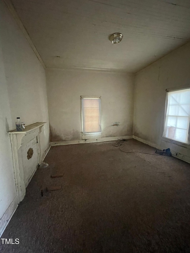 empty room with carpet flooring