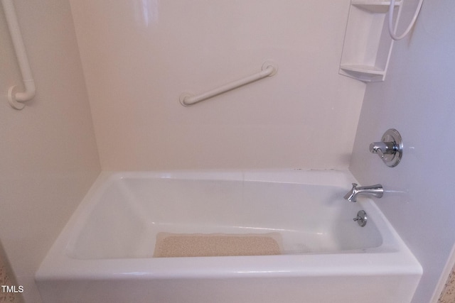 bathroom featuring a tub to relax in