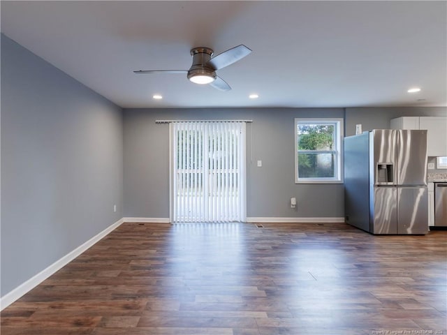 interior space with dark hardwood / wood-style floors and ceiling fan