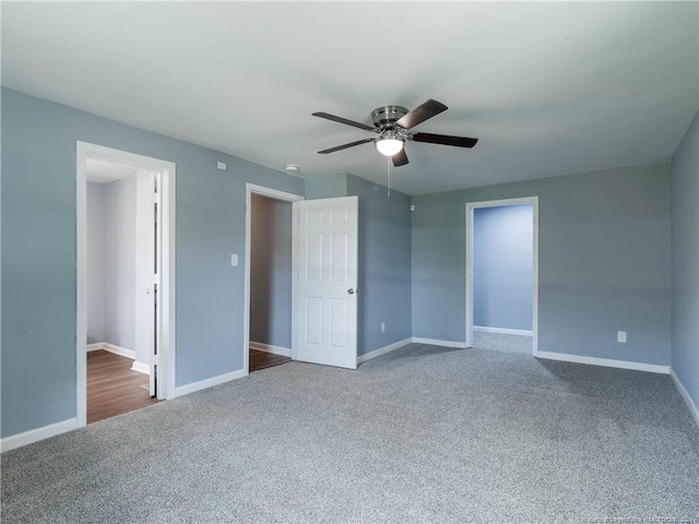 unfurnished bedroom with carpet and ceiling fan