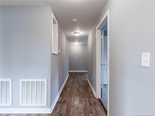 hall featuring dark hardwood / wood-style floors