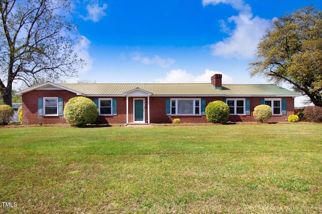 ranch-style home featuring a front yard