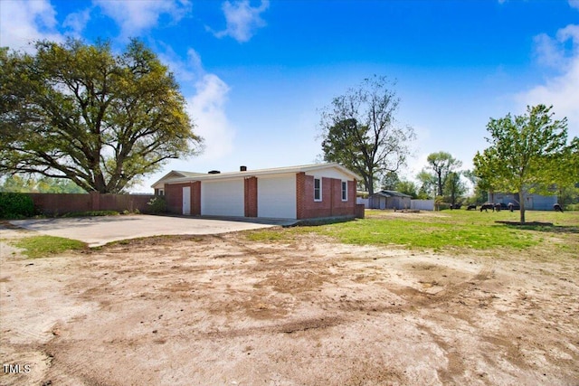 view of home's exterior with a garage