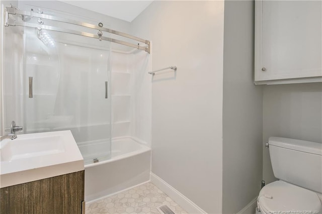 full bathroom featuring bathing tub / shower combination, vanity, and toilet