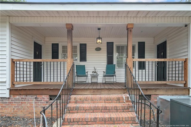 entrance to property with a porch