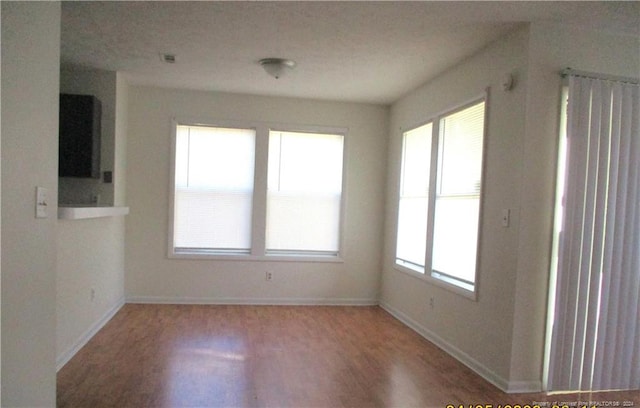 1014 Brookhollow Dr Unit 4, Fayetteville, NC 28314 - spare room featuring wood finished floors and baseboards