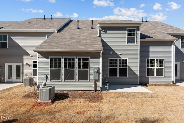 back of house with central AC and a patio