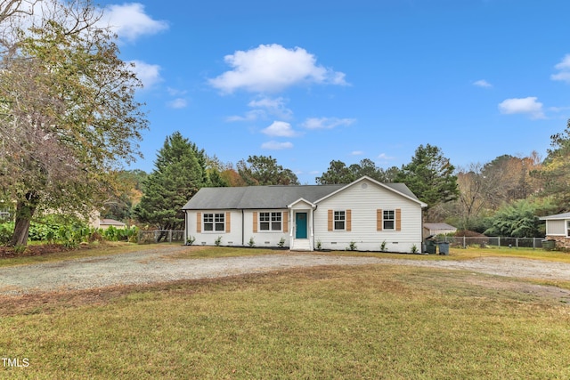 single story home with a front yard