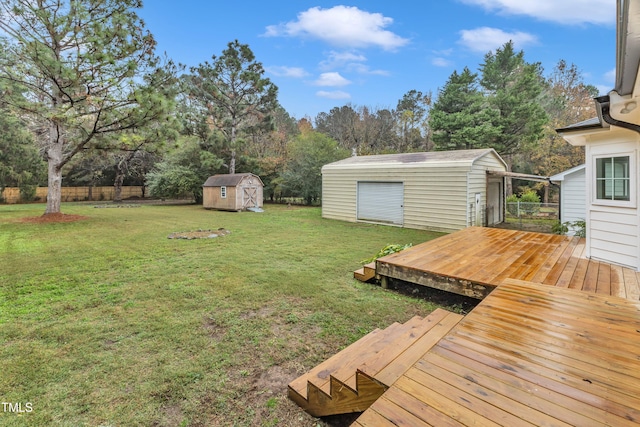 view of yard with a deck and a storage shed