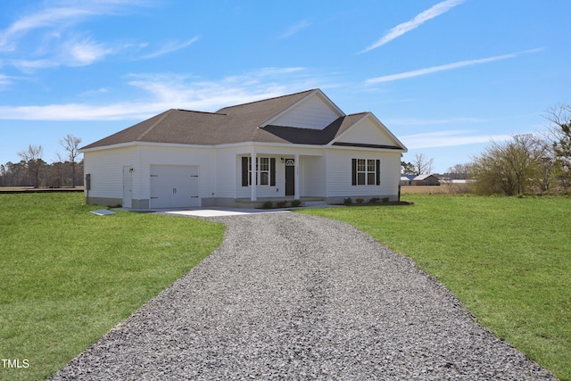 view of front facade with a front lawn, covered porch, gravel driveway, and an attached garage