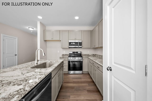 kitchen with gray cabinetry, light stone countertops, sink, stainless steel appliances, and dark hardwood / wood-style flooring