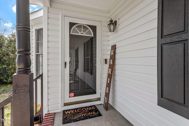 doorway to property featuring a porch