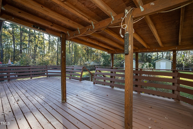 deck with a storage shed