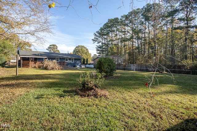 view of yard with a deck