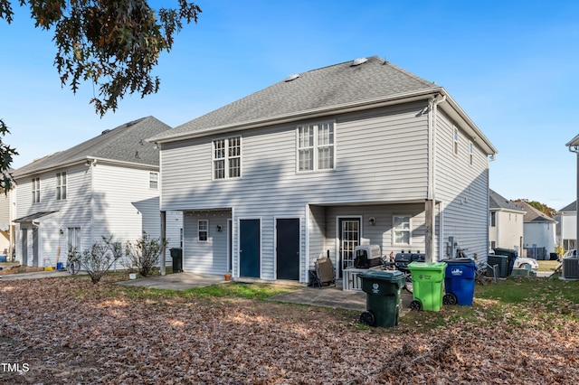 back of house featuring a patio and cooling unit