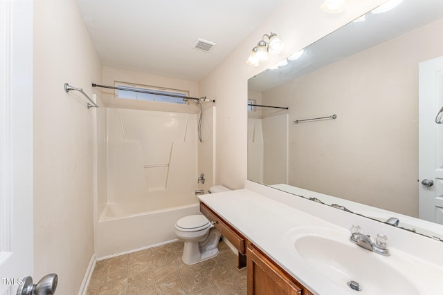 full bathroom featuring toilet, vanity, and washtub / shower combination