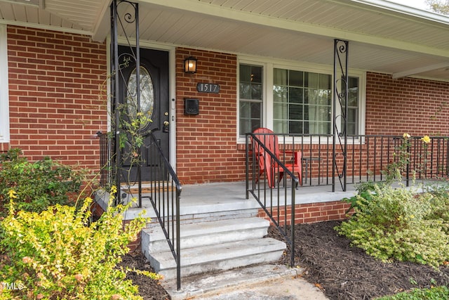 doorway to property with covered porch