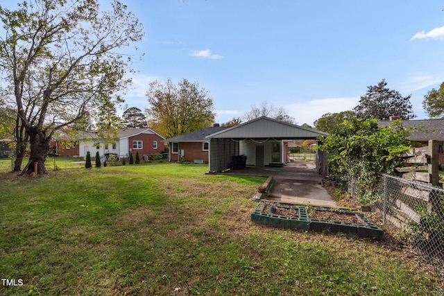 view of yard featuring a carport