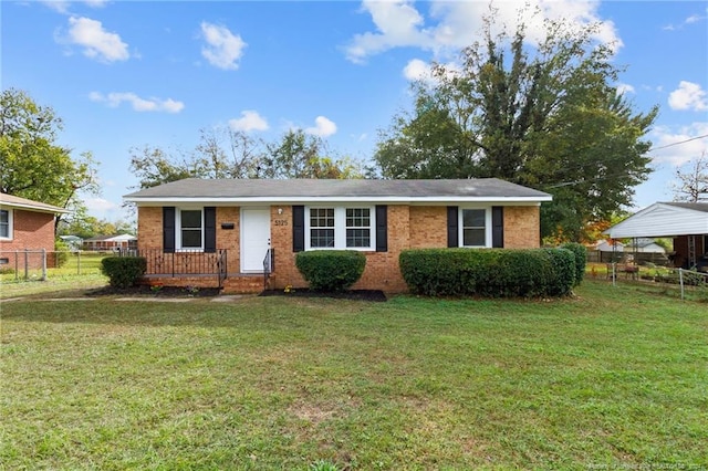 view of front of home featuring a front lawn