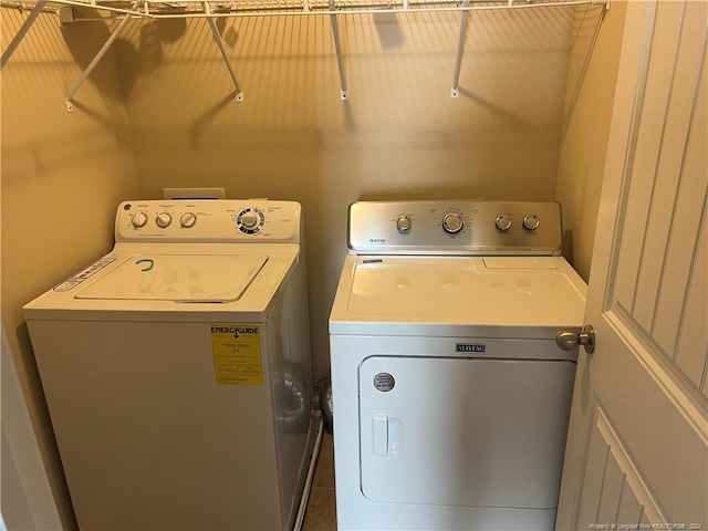 washroom featuring separate washer and dryer