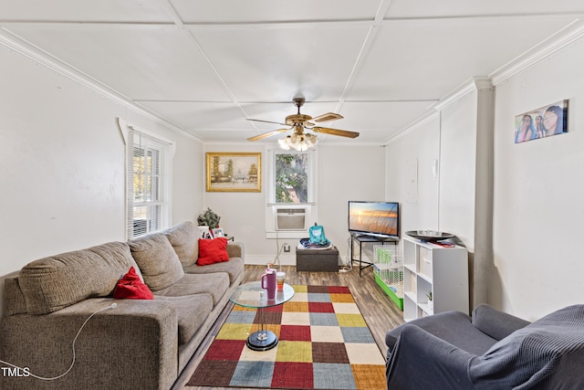 living room featuring hardwood / wood-style floors, ceiling fan, cooling unit, and ornamental molding