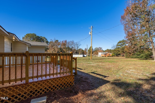 view of yard featuring a wooden deck