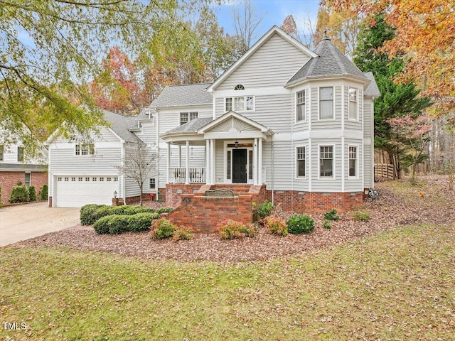 view of front of property with covered porch and a front yard