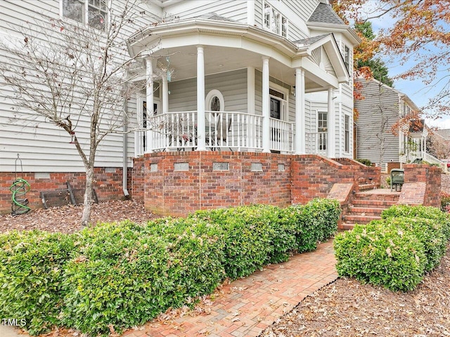 property entrance with a porch