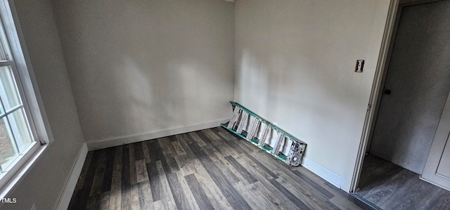 stairs featuring wood-type flooring