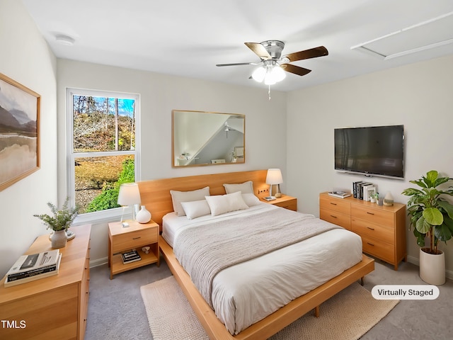 carpeted bedroom with ceiling fan