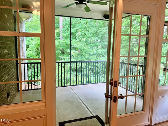 entryway with a healthy amount of sunlight and ceiling fan