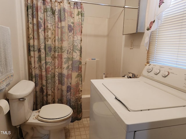 interior space featuring tile patterned flooring, toilet, washer / clothes dryer, and shower / tub combo with curtain