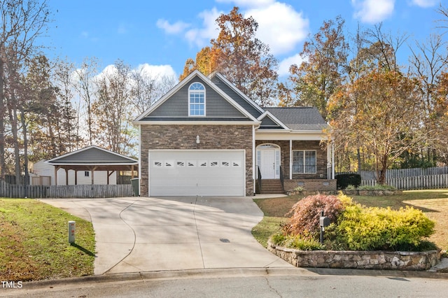 view of front of property with a carport and a garage