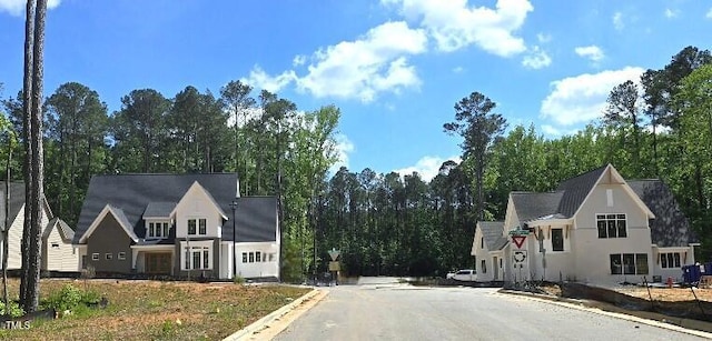 3341 Colby Chase Dr, Apex, NC 27539 - view of asphalt street featuring curbs and traffic signs