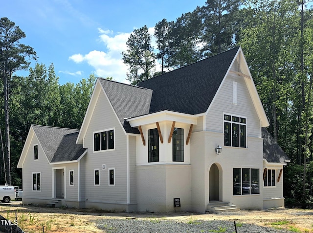 3341 Colby Chase Dr, Apex, NC 27539 - modern farmhouse featuring a shingled roof